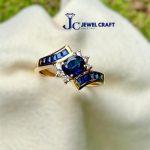 18K Gold Ring with Oval Blue Sapphire, Diamonds & Side Sapphire Brackets